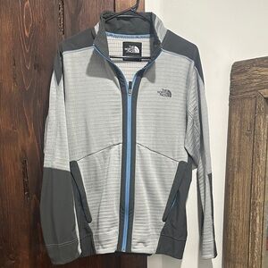 The North Face Men's Gray Jacket with Blue Accents